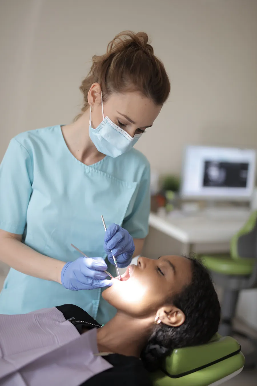 Calm patient receiving gentle dental care